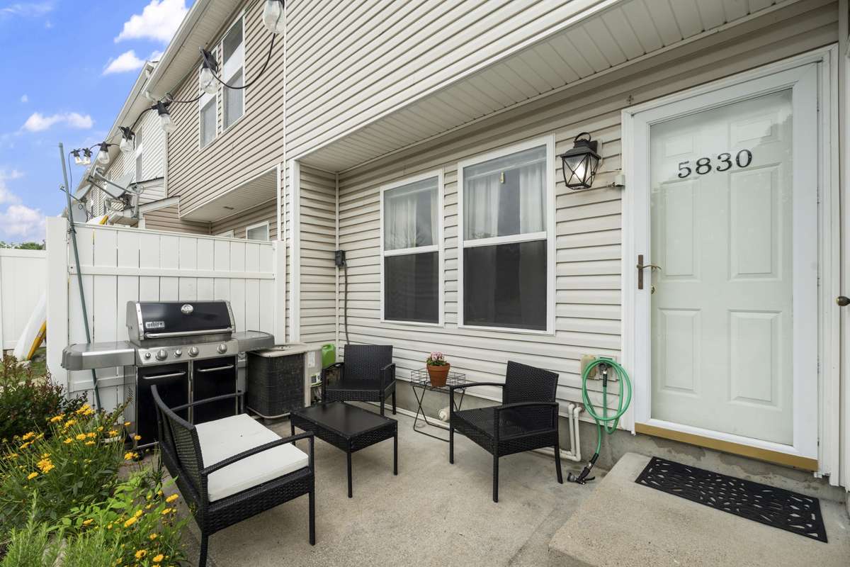 The back patio is the perfect place for you to unwind.