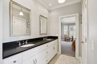 Primary Bath features, double sink, shower and soaking tub
