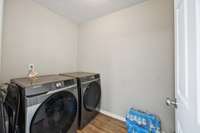 Seperate Laundry Room with door.
