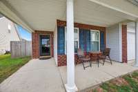 Covered porch for enjoying your cup of coffee or lunch.