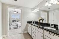 Double vanities in Primary with large shower/tub combo. (previously staged)