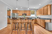 This inviting kitchen is part of an open floor plan
