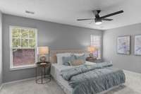 Primary Bedroom fits king size bed nicely with room for dresser and large night stands.