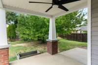 Back porch and fenced yard. Room for pups, grilling and chilling!