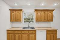 Recessed lighting in the kitchen for a more clean and crisp look.  940 Willow Way Mcminville TN 37110