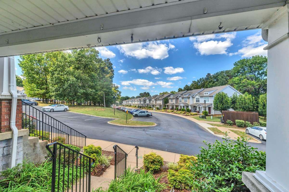 Covered front porch with great views of this well maintained neighborhood and landscaping!