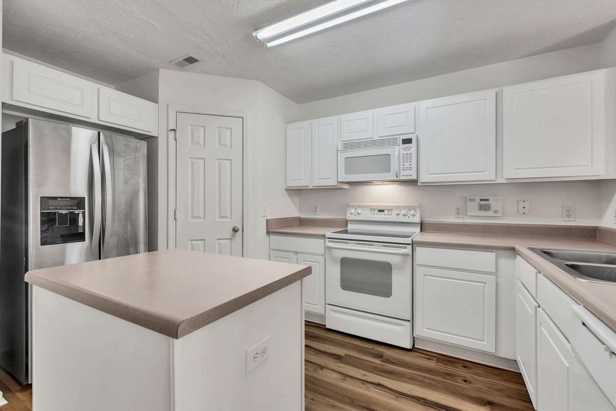All appliances remain! Great SS fridge!!!