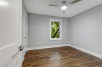 Downstairs bedroom with connected bathroom. (pic from prior listing)