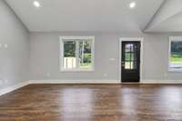 Living room view from kitchen. Tons of natural light! (pic from prior listing)