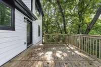 Back deck view toward parking and carport, a side fence was also added. (pic from prior listing)