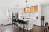 coffee bar off to the left of fridge