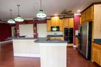 All appliances remain: Refrigerator, cook top, double ovens, microwave, dishwasher plus washer and dryer.