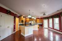 Nice sized kitchen bar. Lots of natural light. More than enough room for everyone .