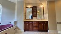 Primary bath. Double vanity, whirlpool tub, seaparate shower and a toilet area.