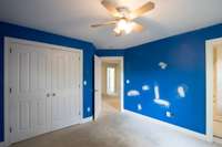 Bedroom 3 upstairs with double size closet and entry to hall bath.