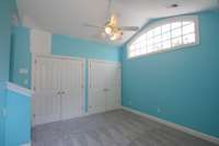 Bedroom 4 upstairs on front side of home. Natuaral light coming in. Double size closet. High ceiling.