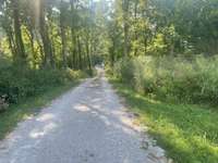 Driveway down the hill as you leave