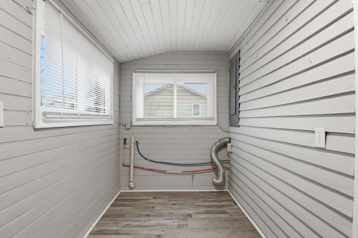 The utility Room is large with room for freezer or storage cabinet