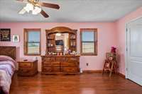 Primary Bedroom with several windows to lighten the room