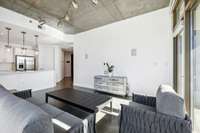 Featuring an open layout that seamlessly connects the living and dining areas.