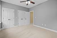 Virtual paint to show that this room has recently been repainted from brown to grey.