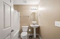 Guests don't need to climb stairs with this private downstairs bathroom.