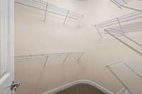 And of course, a generous walk-in closet is included in this primary to help keep everything beautifully organized.