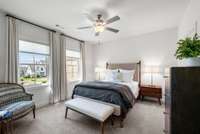 Move in ready with california closets, beautiful window treatments and plush carpet with sound reducing pad for privacy throughout.