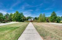 This is the path from Bradbury Ct cut de sac that goes directly to the parks, schools and more. This is totally unique!!!