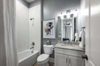 Two full and one half bath on the main floor.