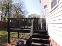 deck off kitchens with a safety gate