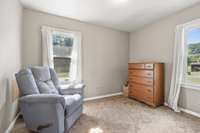 Secondary bedroom. Great for a nursery or guests.