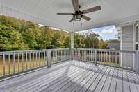 WOW! Check out this oversized covered deck with a view!