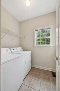 Easily accessible laundry space near the kitchen.