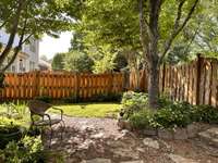 Serene surroundings in the nicely landscaped back yard.