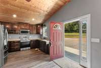 Large wide open kitchen with stainless appliances