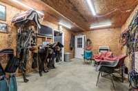 Tack room with extra storage and utility room