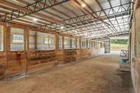 Large doors on both ends of attached barn