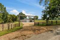 With only a couple homes on the whole road, if privacy and security is what you are seeking, it’s here.