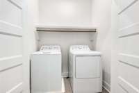 Laundry is also located on the bedroom level of the home, and the Washer and Dryer remain.
