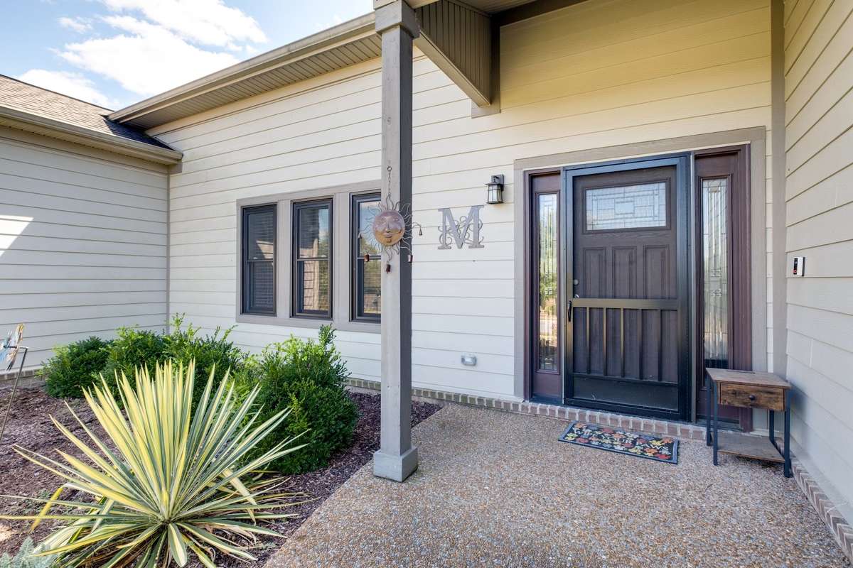 Covered front porch entry.
