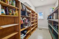 Huge walk in pantry located just off the kitchen.