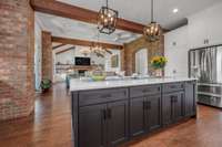 Upsized Island View Into Dining & Living Room