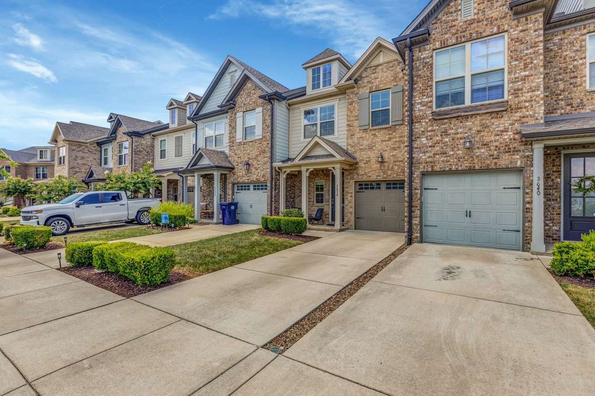 One car garage with additional parking pad