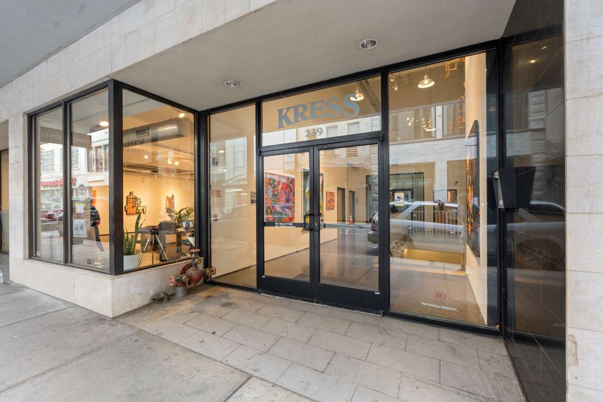 Shot of front Kress building. Double secured with keypad entry at front door, and another keypad entry before elevators. Unit comes with a designated parking space inside the garage.
