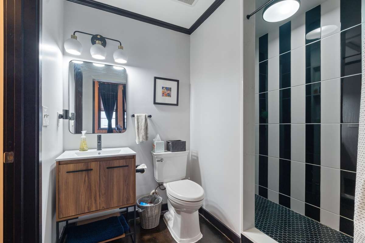 Full bathroom in main bedroom. Walk-in closet off to the left.