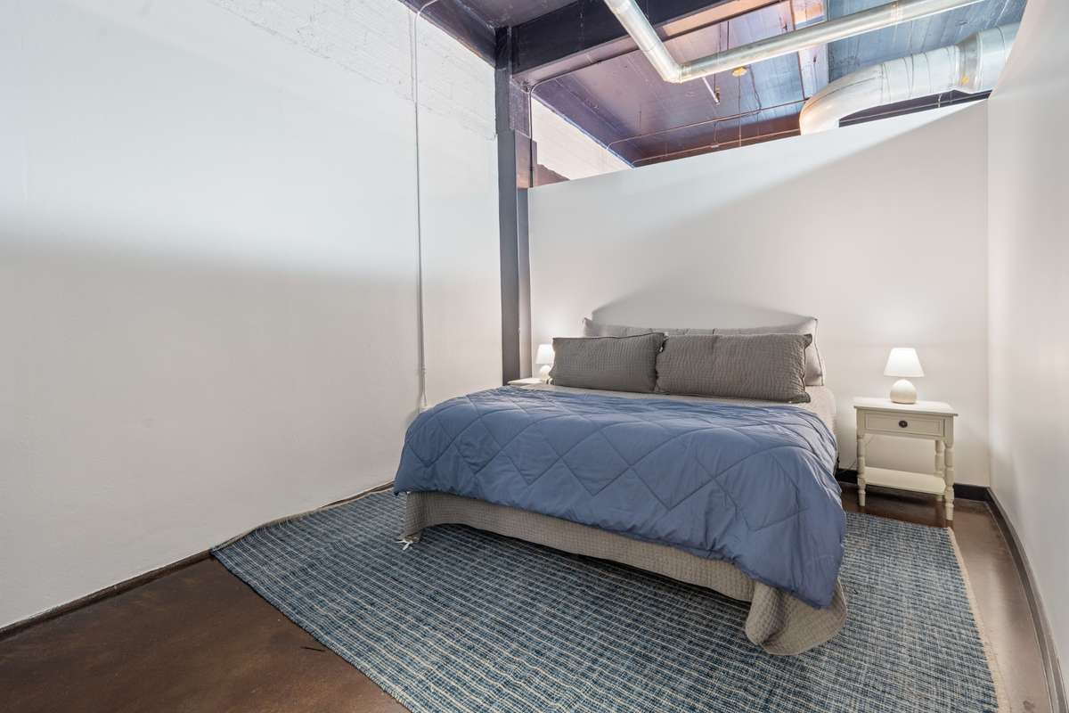 Second bedroom with walk in closet and en suite full bathroom.