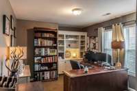 Bright and spacious, the sitting area/office provides the perfect spot to relax or work from home.