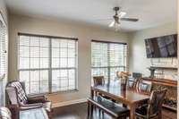 Situated adjacent to the kitchen, the den provides flexible living space with lots of natural light.