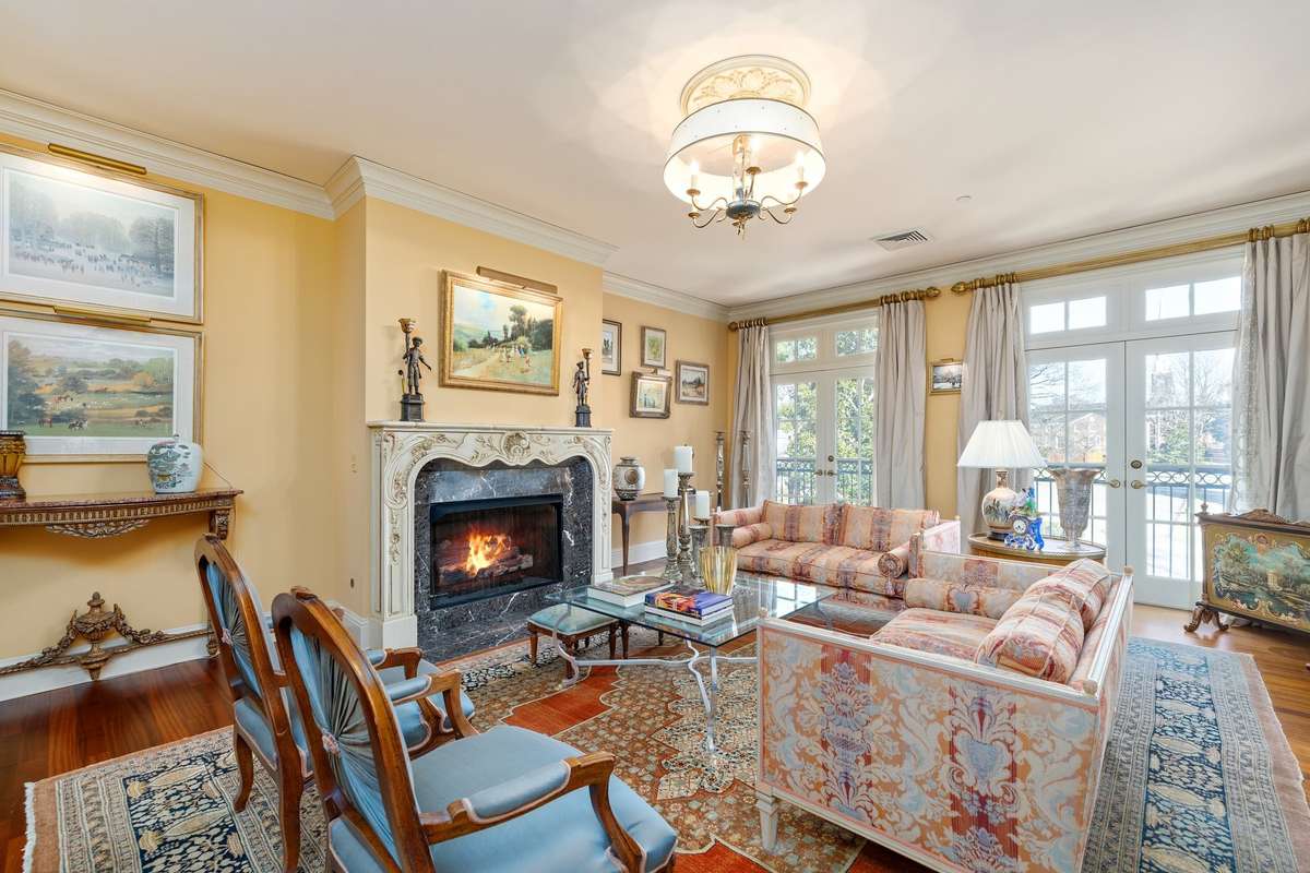 Although particularly styled, this space truly is a blank canvas, ready to make it your own. Notice the two French doors leading out to a stunning Nashville view. Pictures taken when home was furnished. Condo is currently unfurnished.
